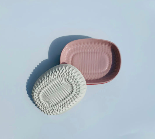 a couple of plates sitting on top of a table