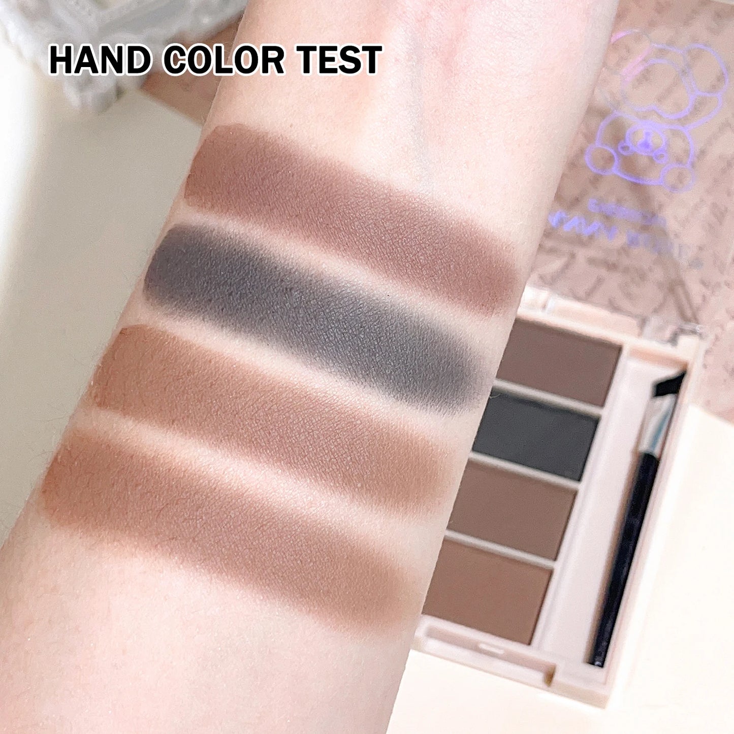 A set of 4-color eyebrow powder trays with brushes in gray and brown matte tones for long-lasting color rendering, filling and s